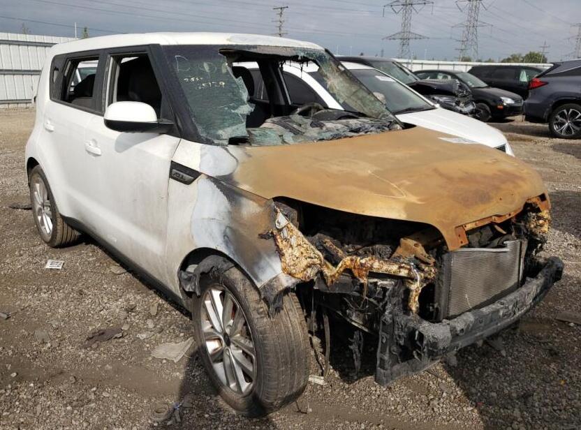 White Kia with Bad Engine and Fire Damage